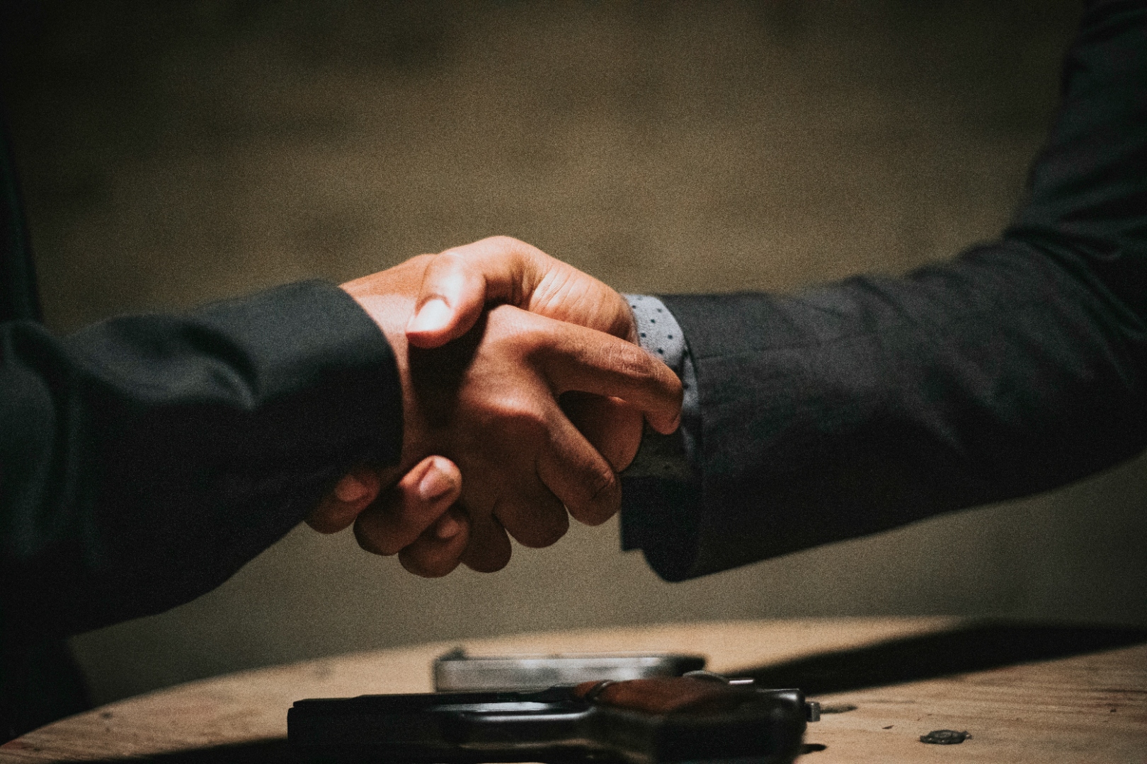 Hotel investment advisory handshake
